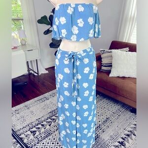 Size medium two piece set perfect for vacations or beach wear with floral design